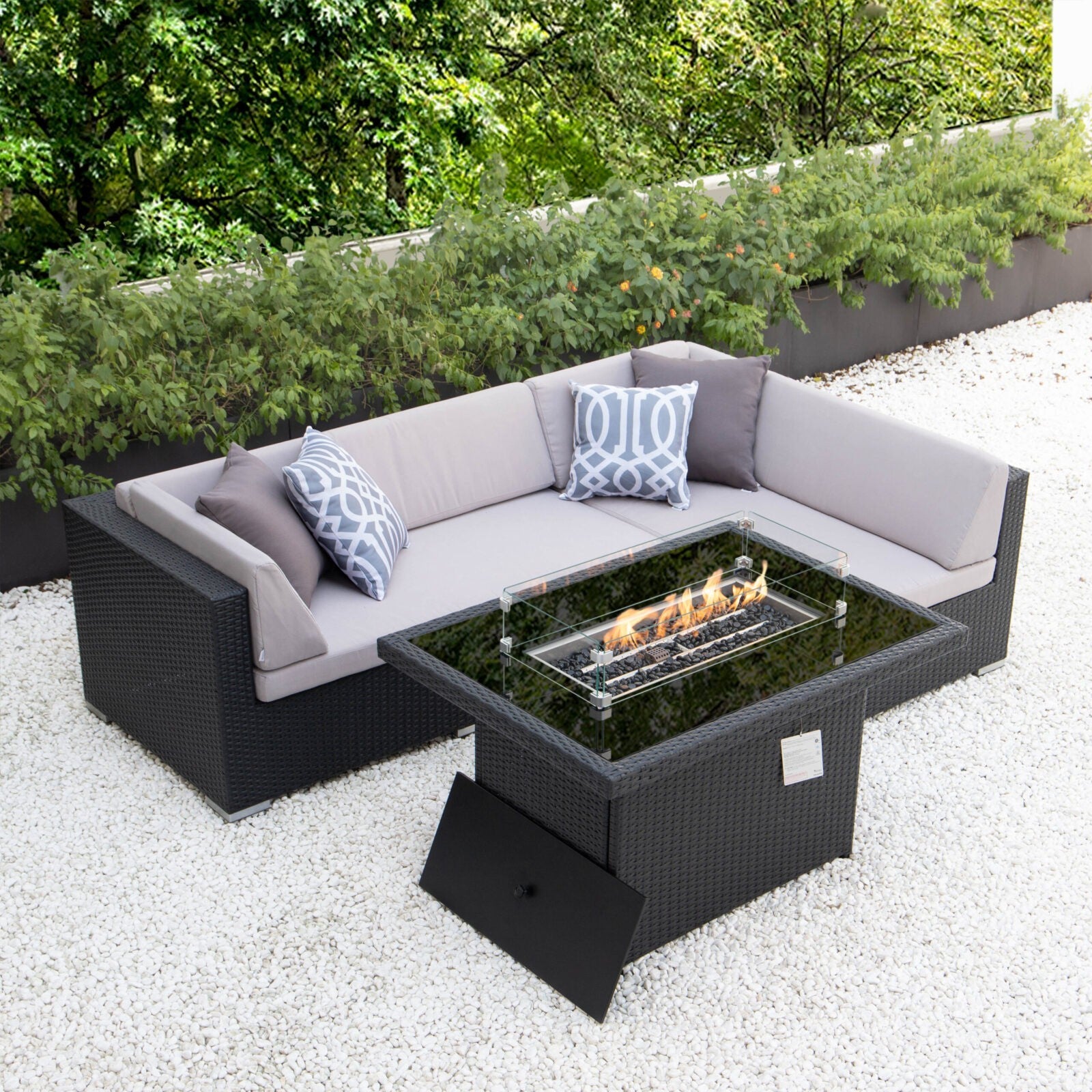 Small L with fire table and light grey cushions image 0