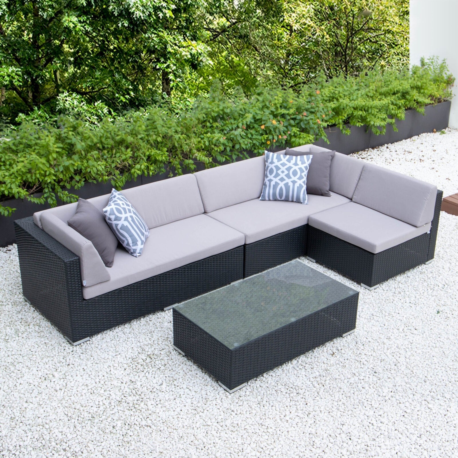 Classic L with glass table and light grey cushions image 0