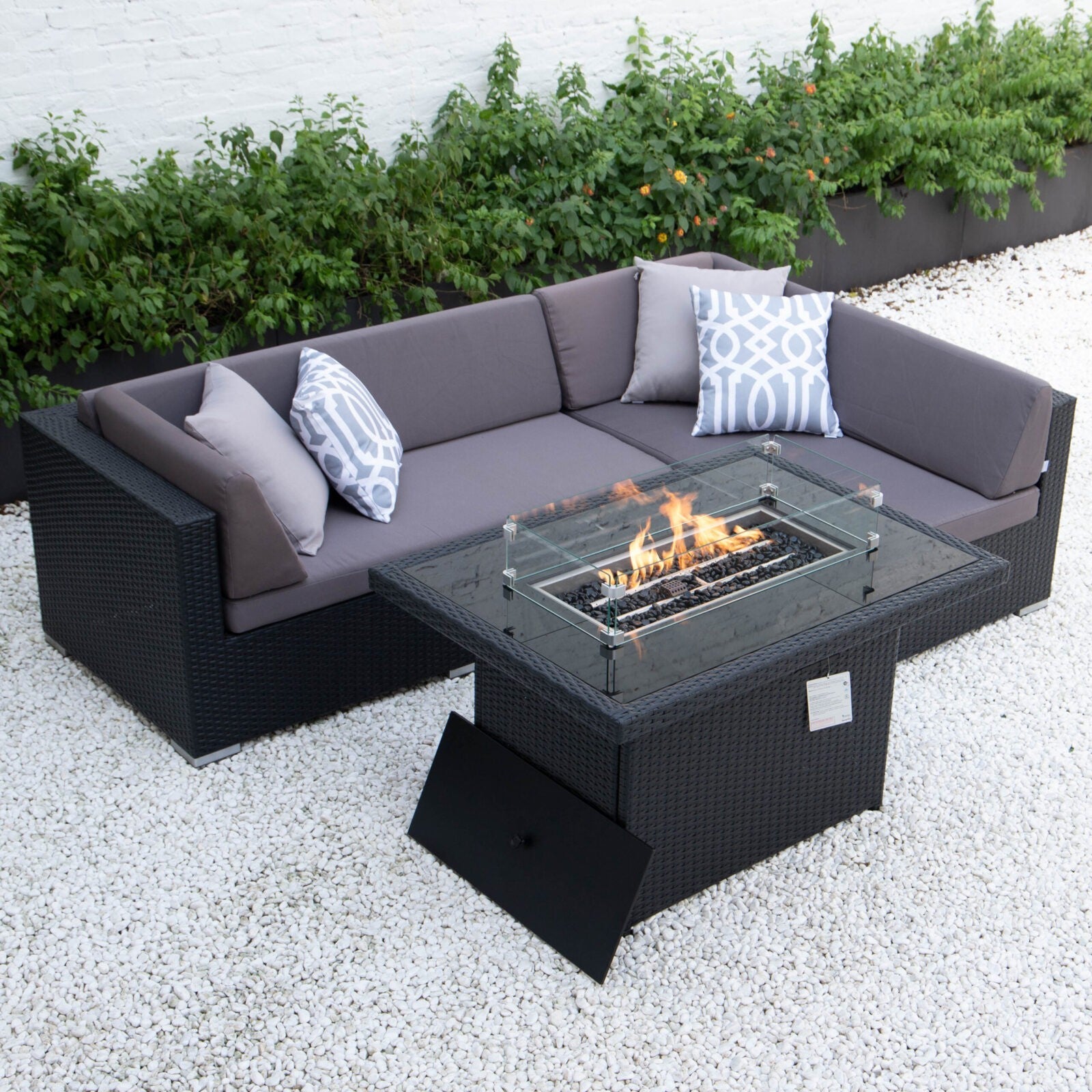 Small L with wicker fire table in dark grey cushions image 0