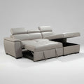 Gray sectional sofa with storage drawers in a living room setting