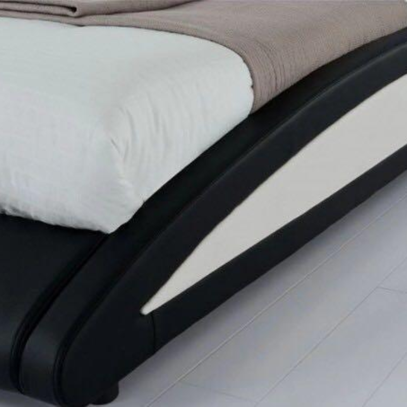 Modern black bed frame with LED lighting on a white floor