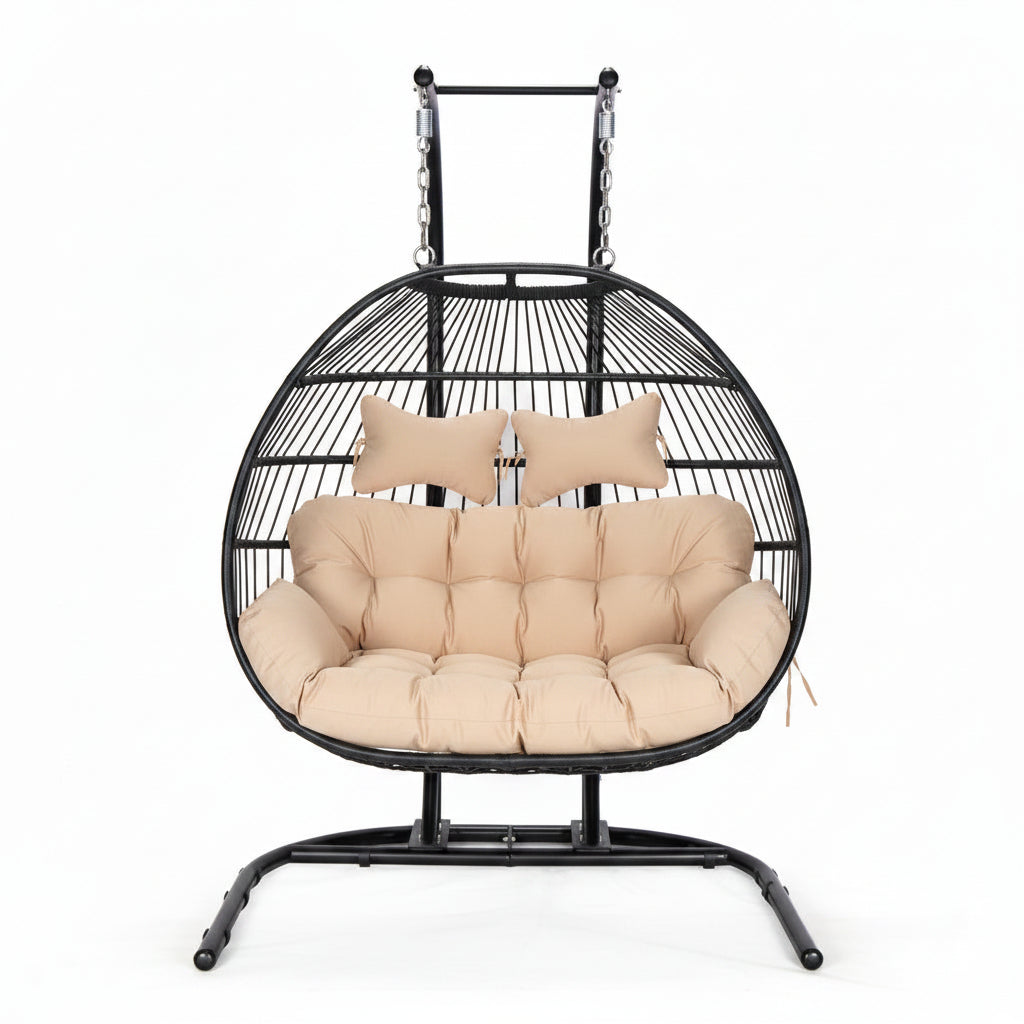 Hanging egg chair with beige cushions on a white background