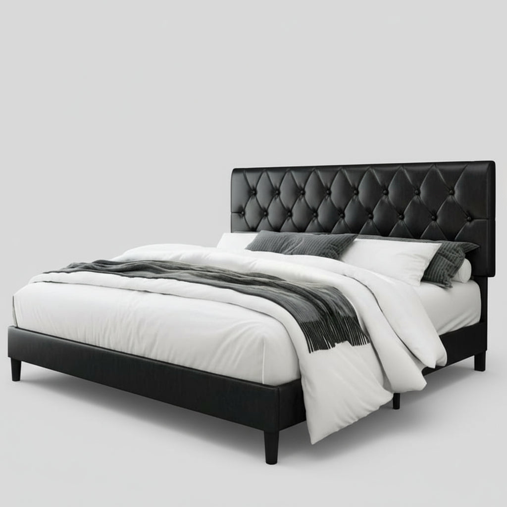 Black tufted bed with white bedding in a modern bedroom setting.
