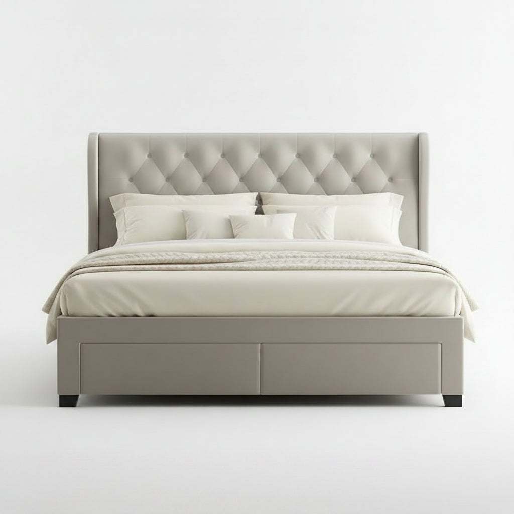 A bed with a tall tufted headboard and matching footboard upholstered in smooth light gray velvet, styled with patterned pillows and a neutral bedding set in a bright bedroom. A text banner at the bottom reads 'Smooth Velvet Upholstery'.