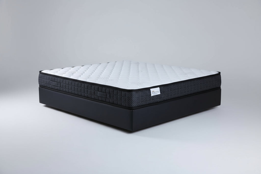 Black mattress with 'Shapes' logo on a white background