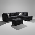 Black sectional sofa with ottoman in a living room setting