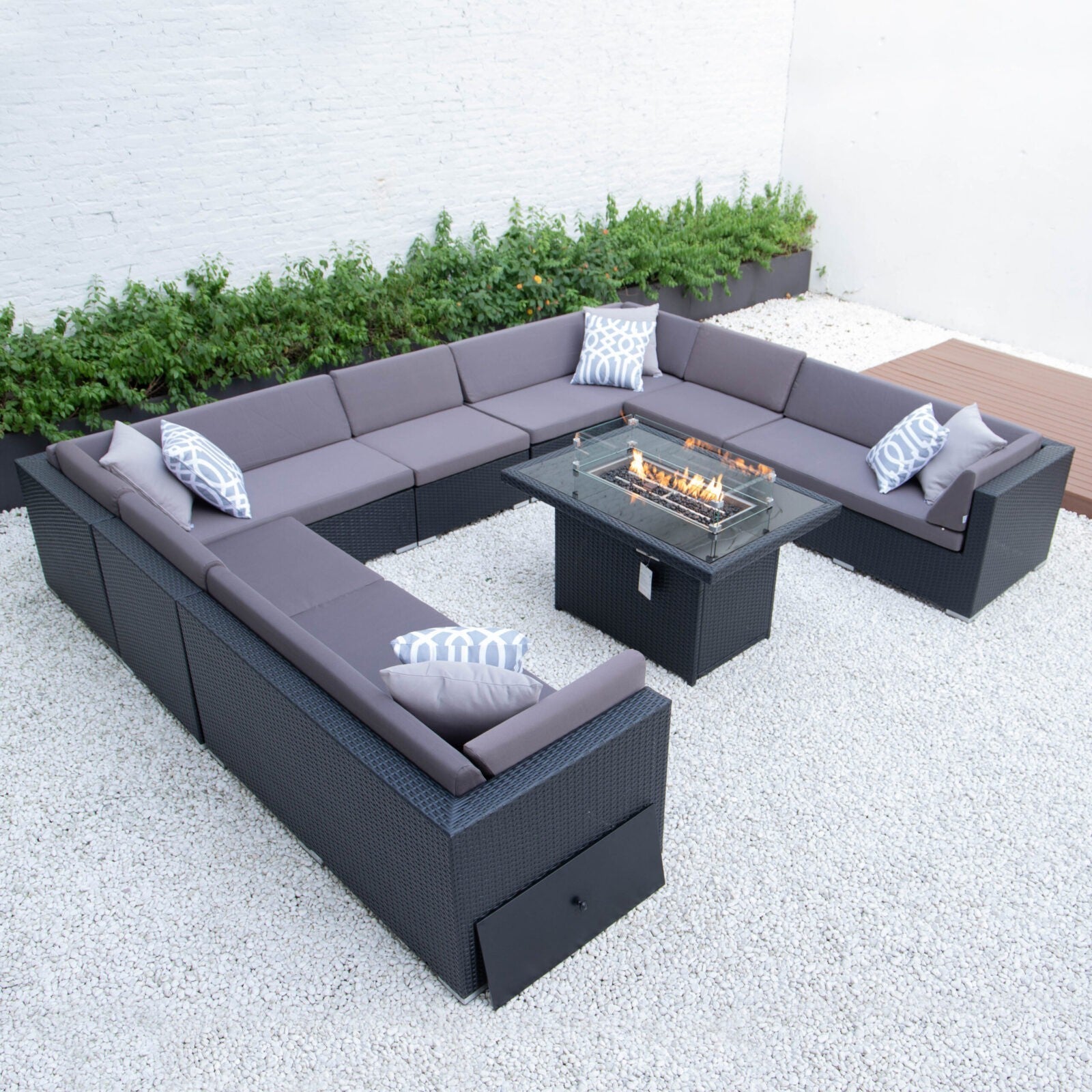Giant u shaped with wicker fire table in dark grey cushions image 0