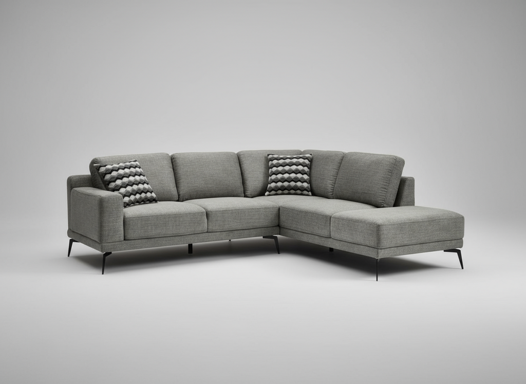 Gray sectional sofa with textured backrests on a gray background