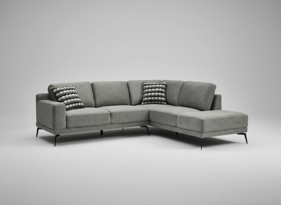 Gray sectional sofa with textured backrests on a gray background