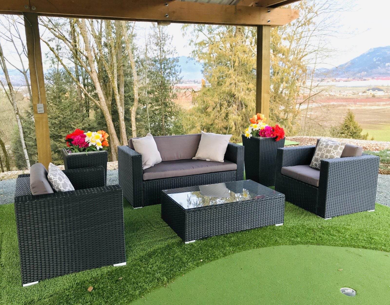 4 piece conversation set with glass table and dark grey cushions image 0