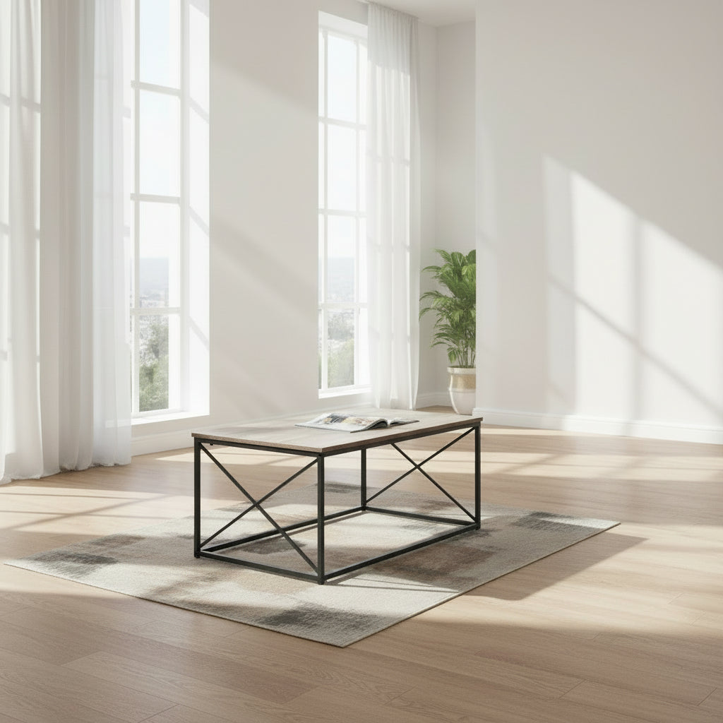 Modern coffee table with two side tables in a room with large windows.
