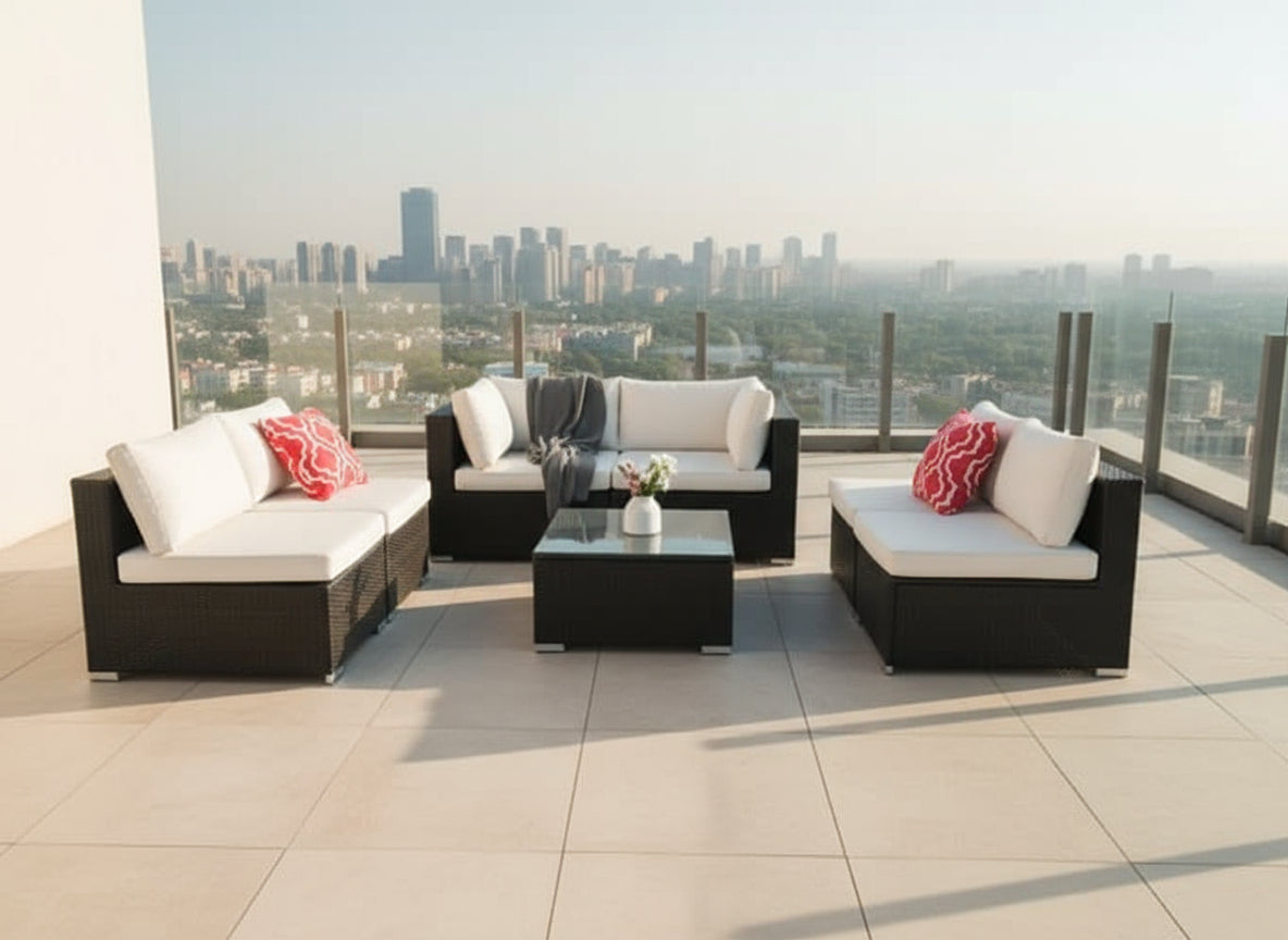 Outdoor patio furniture set with cushions on a wooden deck