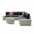 Outdoor furniture set with a sectional sofa and round table on a beige background